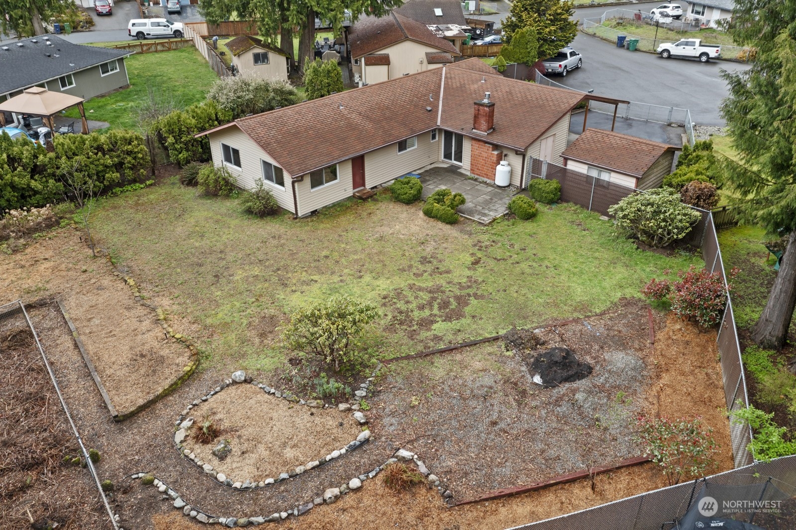 19211 3rd Drive Southeast Bothell, WA 98012 - Photo 5 of 37 an aerial view of a house with a yard and greenery