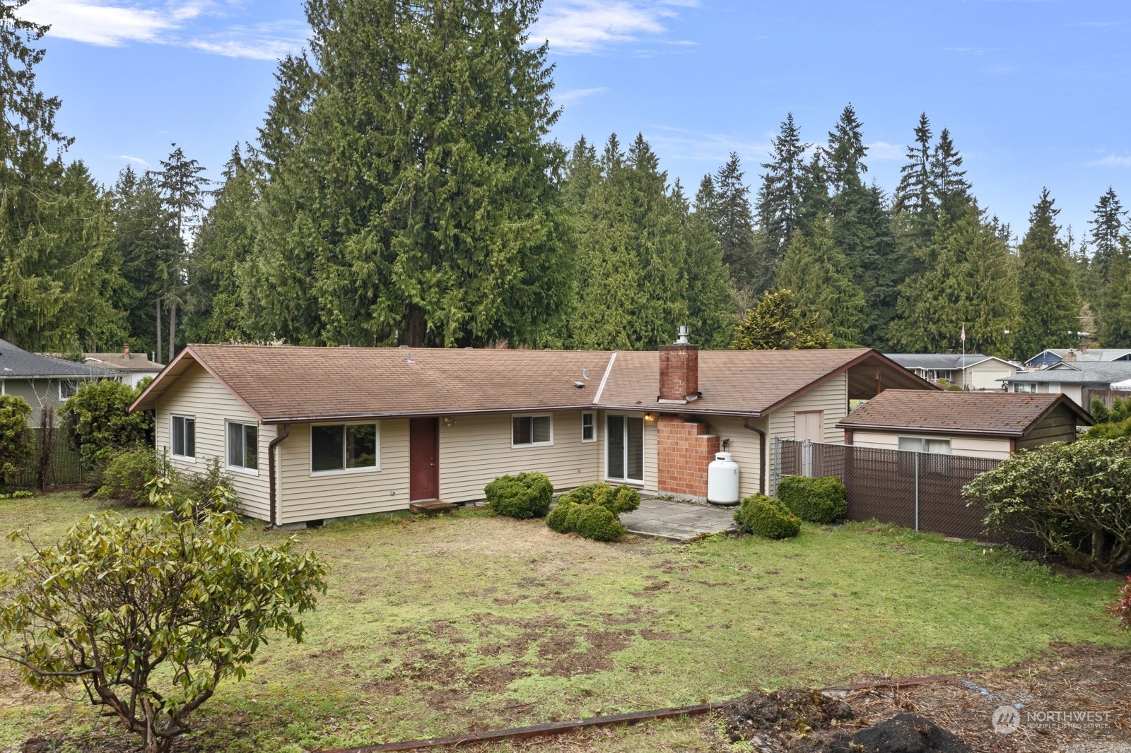 19211 3rd Drive Southeast Bothell, WA 98012 - Photo 7 of 37 a front view of a house with a garden