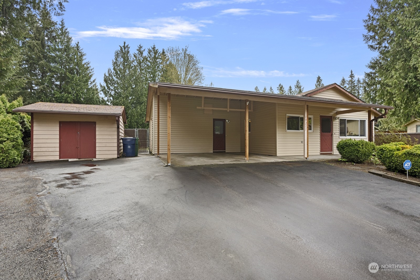 19211 3rd Drive Southeast Bothell, WA 98012 - Photo 8 of 37 a view of a house with a yard and garage