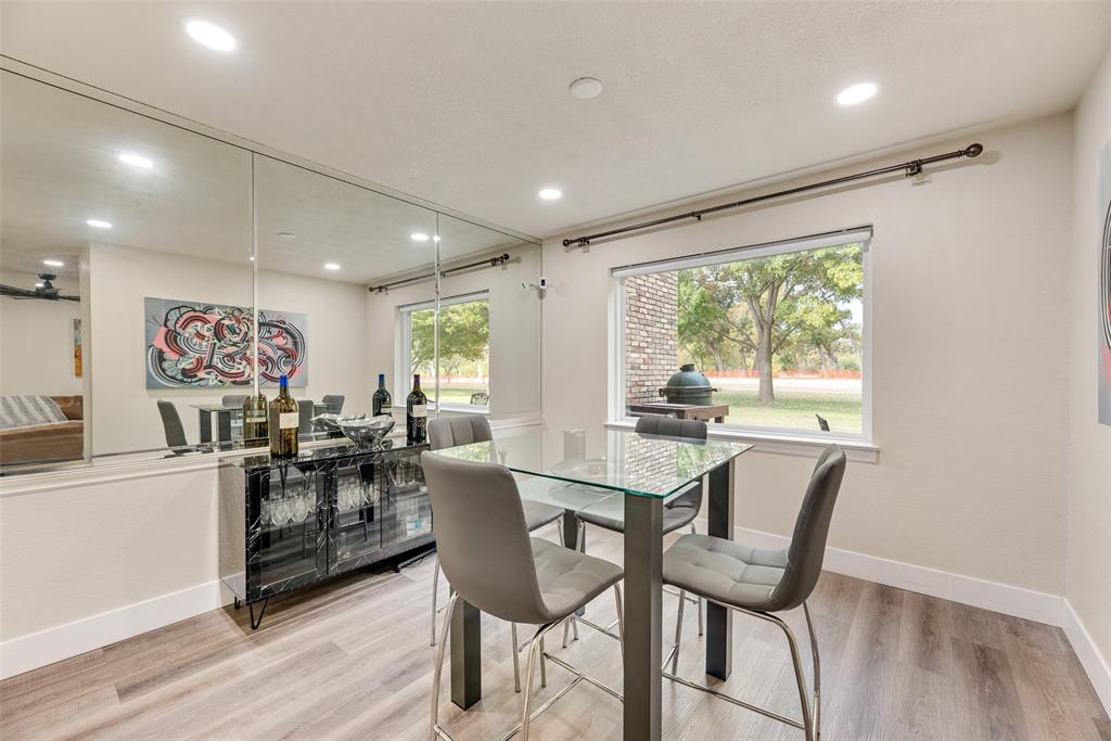 61 1 Main Place Benbrook, TX 76126 - Photo 10 of 21 a view of a dining room with furniture window and outside view