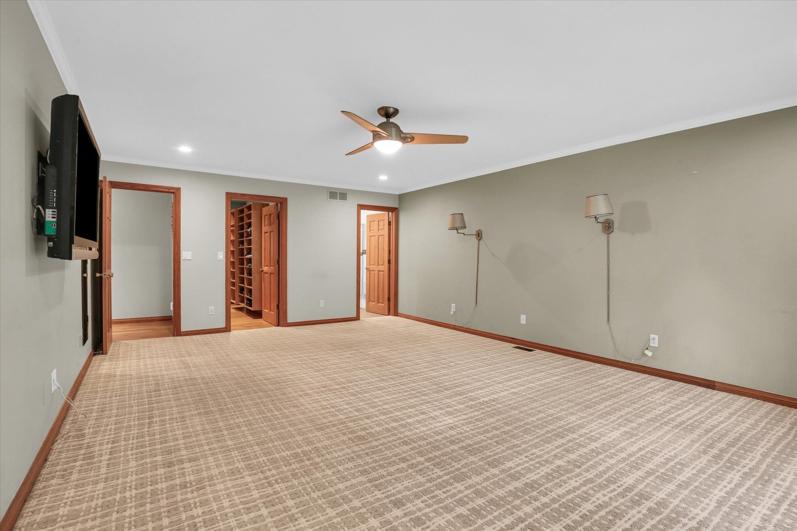 2706 North Salisbury Court Champaign, IL 61821 - Photo 34 of 60 a view of an empty room with a ceiling fan