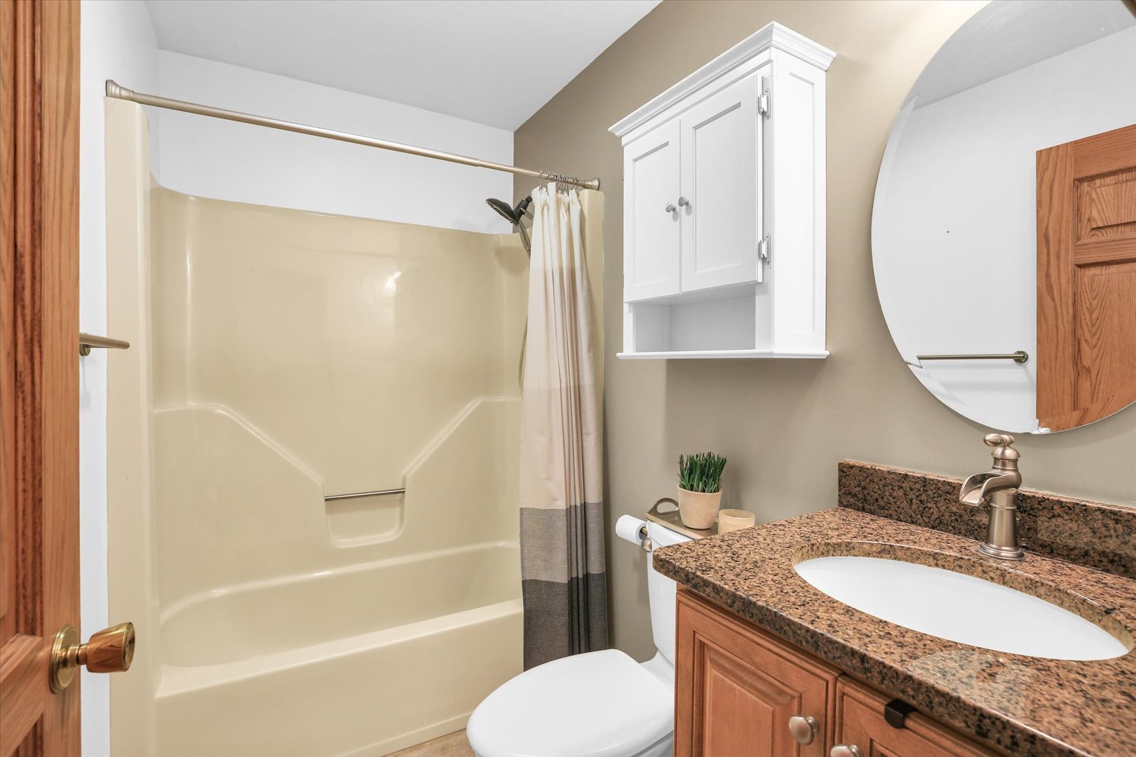 2706 North Salisbury Court Champaign, IL 61821 - Photo 41 of 60 a bathroom with a granite countertop sink toilet and shower