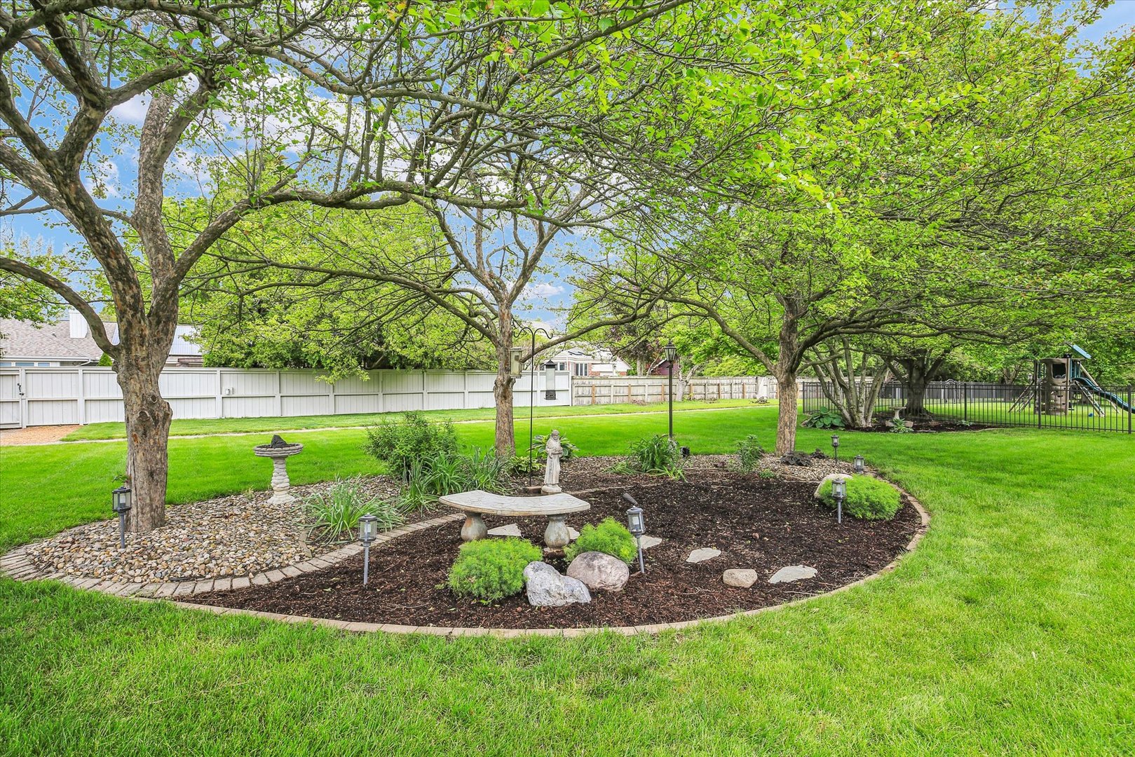 2706 North Salisbury Court Champaign, IL 61821 - Photo 51 of 60 a view of a garden with large trees