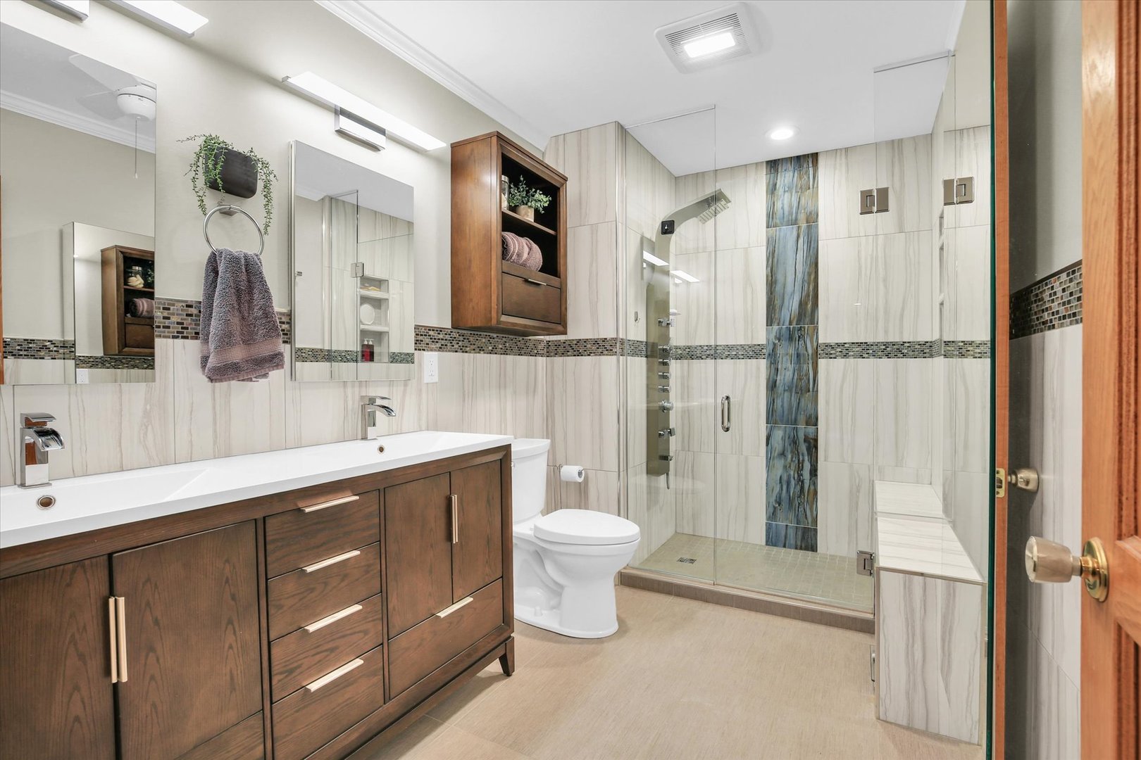 2706 North Salisbury Court Champaign, IL 61821 - Photo 8 of 60 a bathroom with a toilet sink and mirror