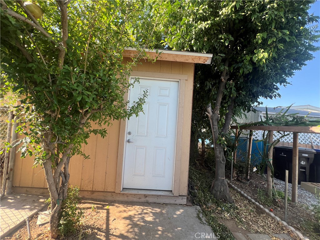 1560 Massachusetts, Unit 89 Riverside, CA 92507 - Photo 17 of 20 Back shed
