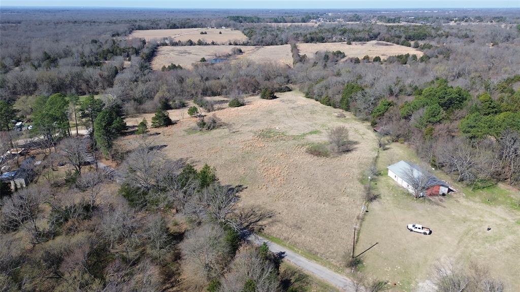 Lot 8 Rains Cr1140 Road Emory, TX 75440 - Photo 4 of 5 an aerial view of a house with a yard