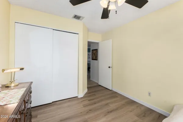 a bed room with a bed and a window