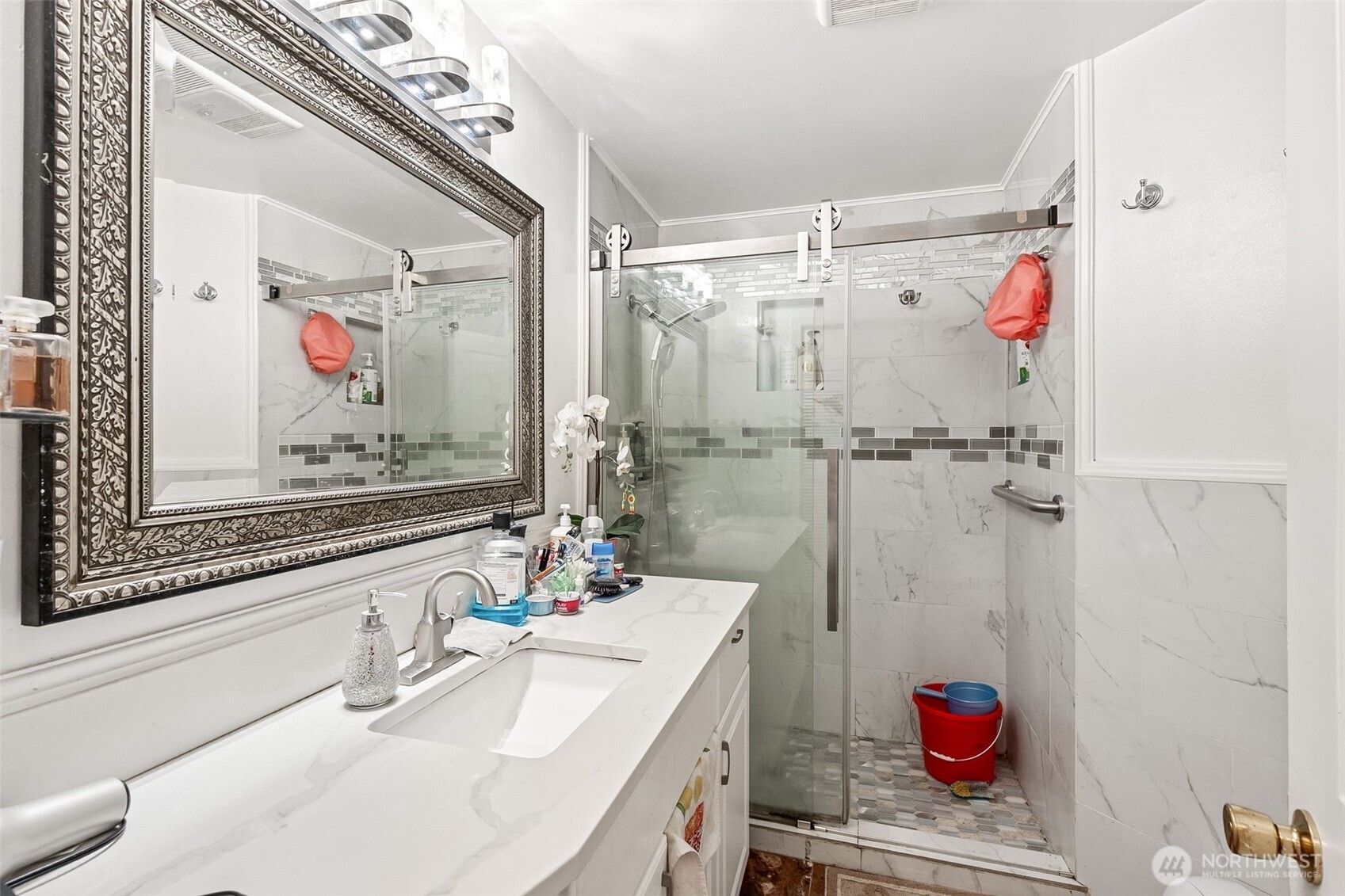 13718 Macadam Road South Tukwila, WA 98168 - Photo 8 of 12 a bathroom with a sink a bath tub and shower
