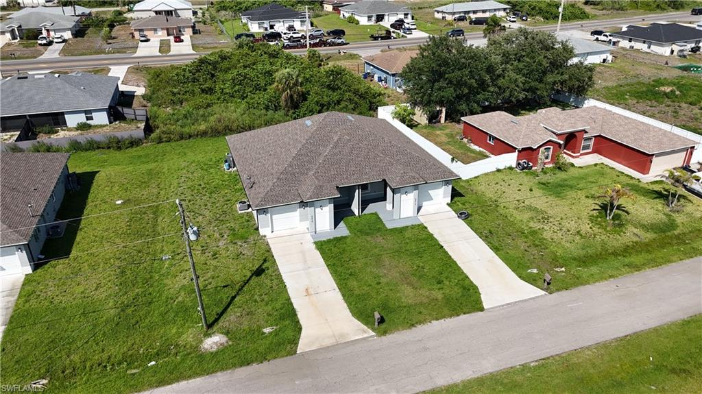 4816 24th Street Southwest Lehigh Acres, FL 33973 - Photo 32 of 32 an aerial view of a house