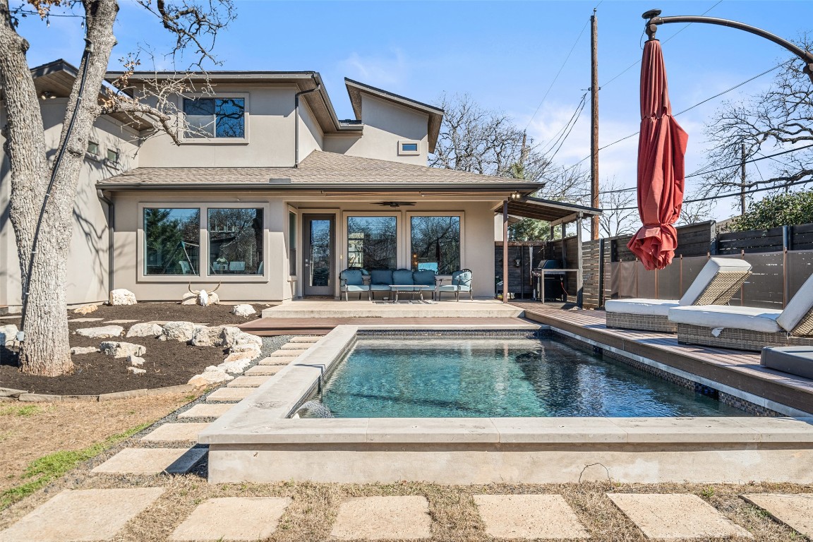 10804 Rush Road, Unit 2 Austin, TX 78732 - Photo 1 of 1 a view of a house with a swimming pool