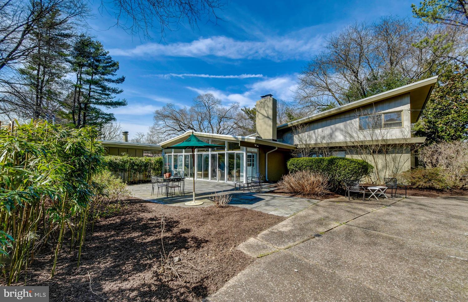 Rear View with terraces and sunroom