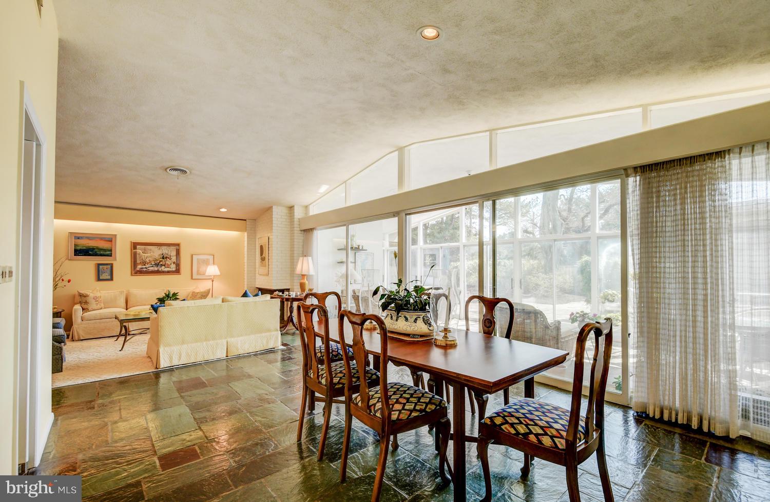 8000 Long Meadow Road Baltimore, MD 21208 - Photo 11 of 40 Dining, Living, Vaulted Ceiling