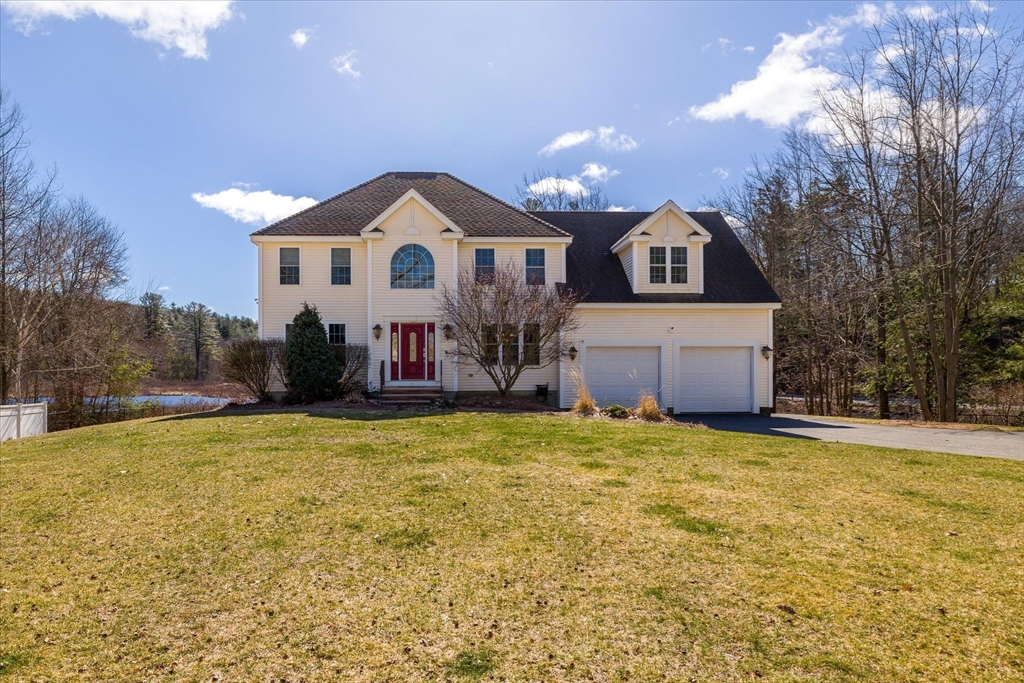 5 Gatehouse Road Westminster, MA 01473 - Photo 1 of 37 a front view of a house with a yard and garage