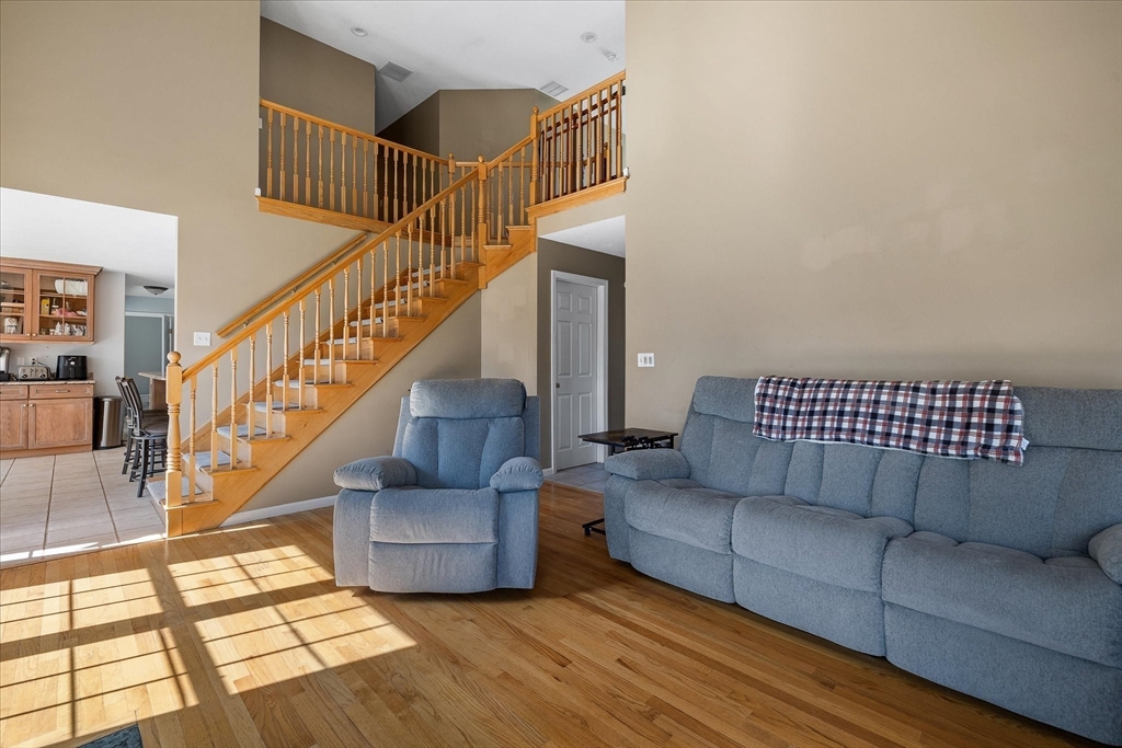 5 Gatehouse Road Westminster, MA 01473 - Photo 15 of 37 a living room with furniture and stairs
