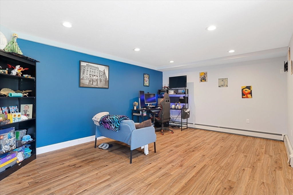 5 Gatehouse Road Westminster, MA 01473 - Photo 31 of 37 a living room with furniture and a wooden floor