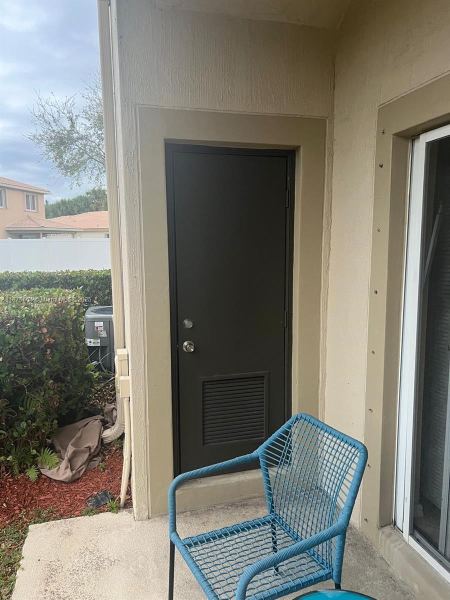 13218 Southwest 44th Street, Unit 11106 Miramar, FL 33027 - Photo 17 of 23 a living room with furniture and a window