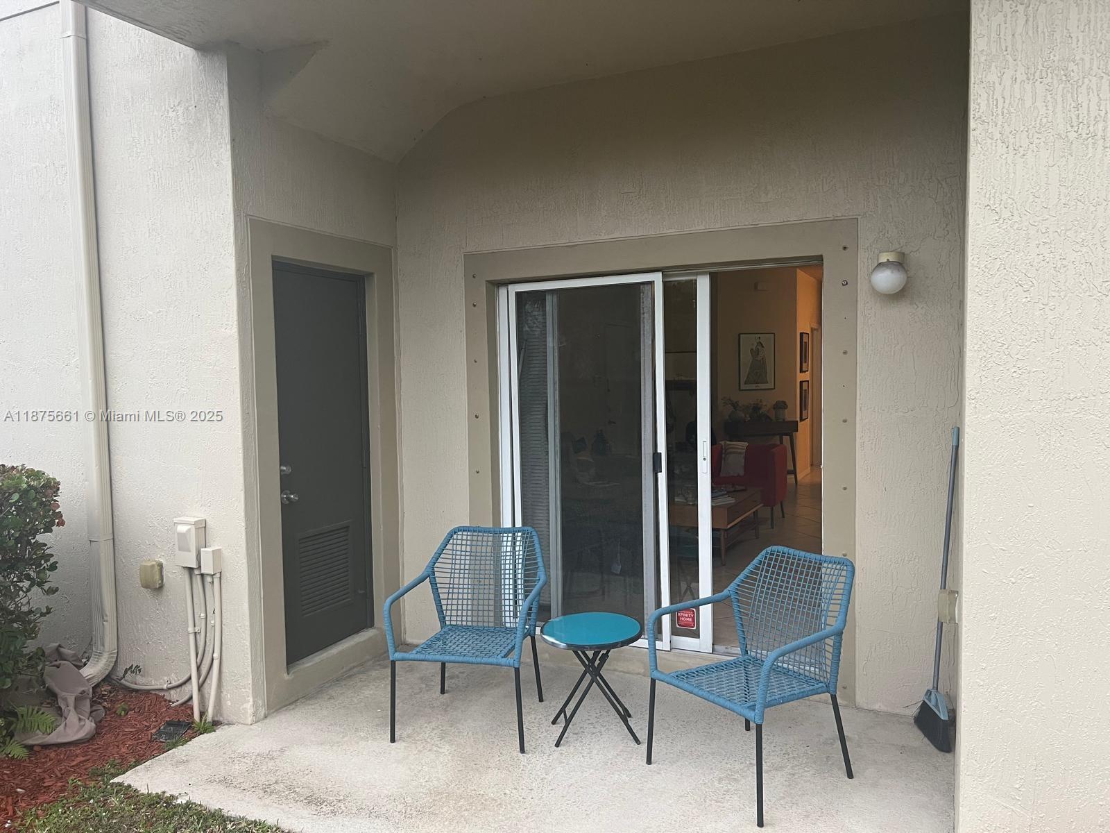 13218 Southwest 44th Street, Unit 11106 Miramar, FL 33027 - Photo 18 of 23 a view of a room that has a table and chair