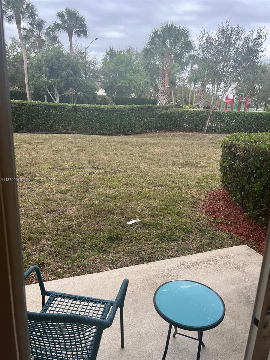 13218 Southwest 44th Street, Unit 11106 Miramar, FL 33027 - Photo 19 of 23 a view of outdoor space and lake view