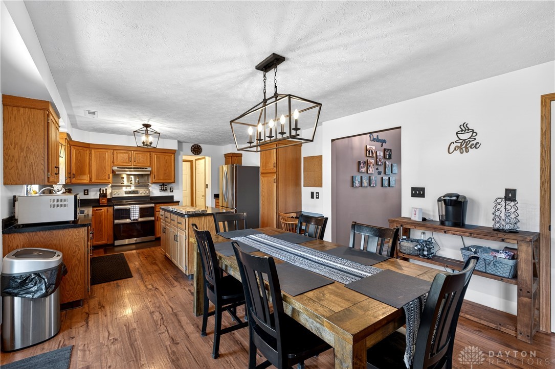 6560 Snyder Road Fletcher, OH 45326 - Photo 17 of 71 This spacious kitchen and dining area features abundant cabinetry and seamless flow for entertaining.