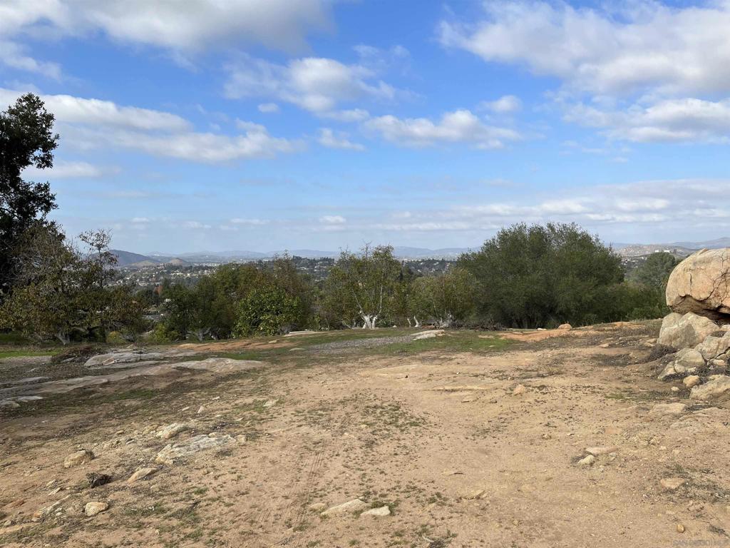 13610 Orchard Gate Rd-vacant Poway, CA 92064 - Photo 13 of 46 a view of dirt road with a building in the background