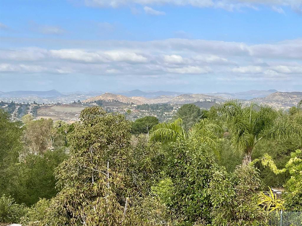 13610 Orchard Gate Rd-vacant Poway, CA 92064 - Photo 24 of 46 a view of a city with lush green forest