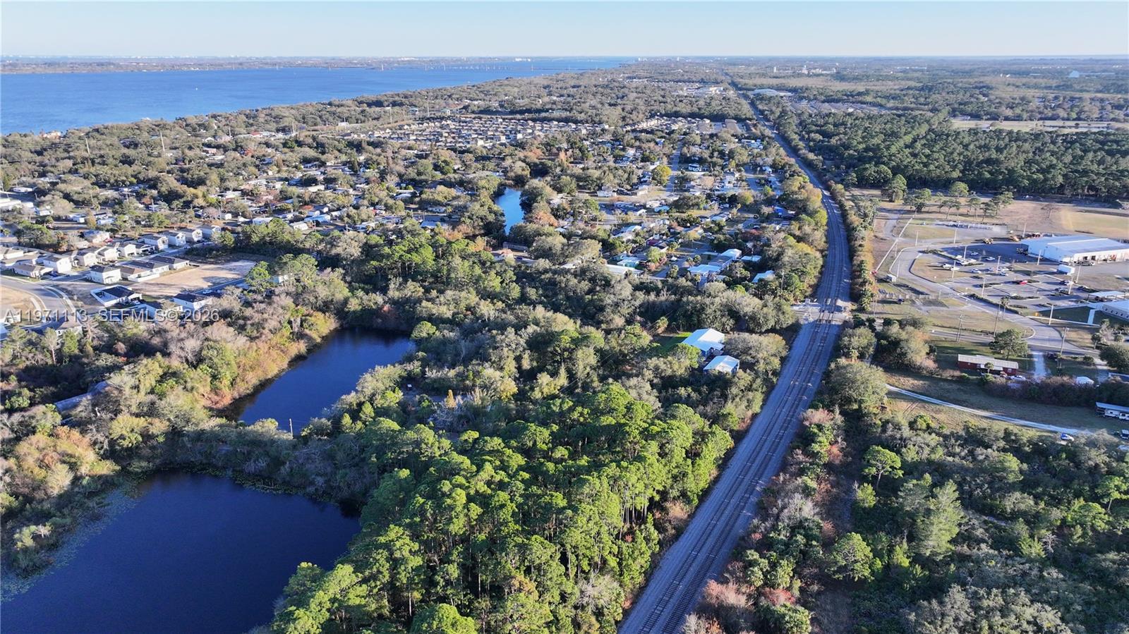 Not Assigned Cocoa, FL 32922 - Photo 4 of 6 an aerial view of multiple house