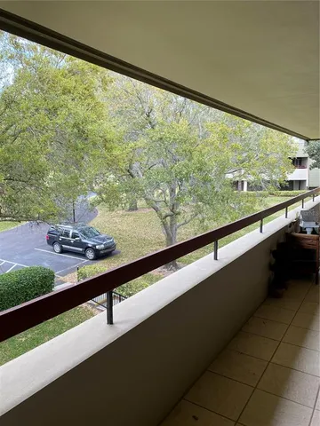 a view of a lot of trees and a window