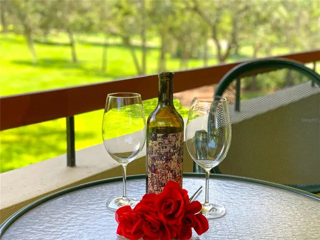 a view of swimming pool with a patio