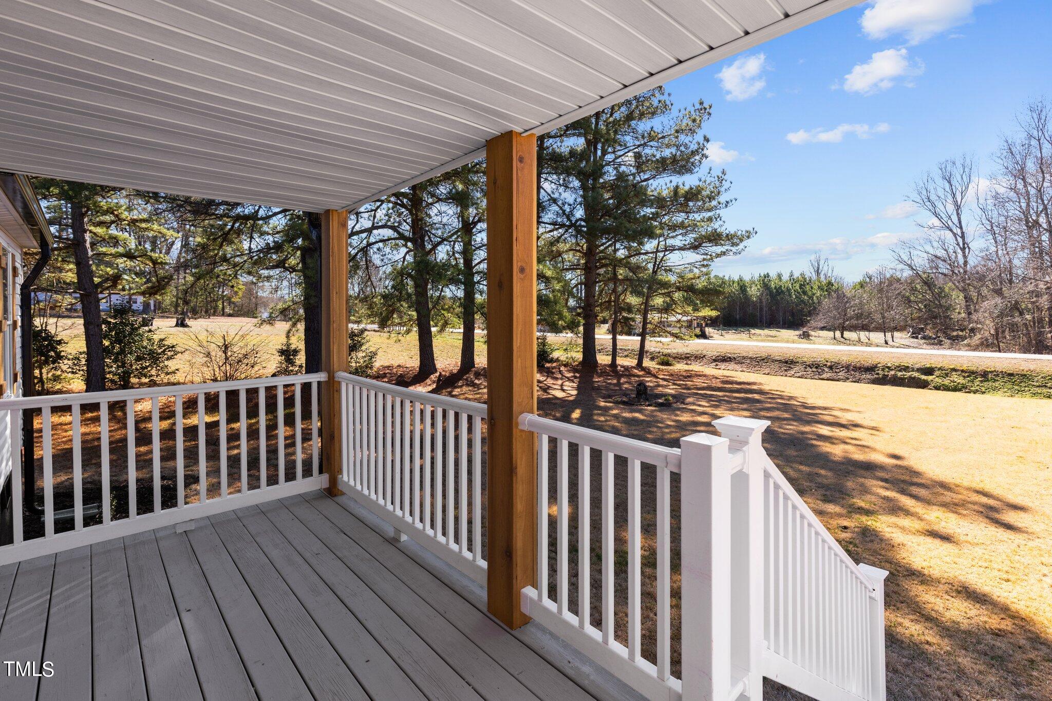 365 Rev Henderson Road Henderson, NC 27537 - Photo 35 of 48 a view of a wooden deck and city view