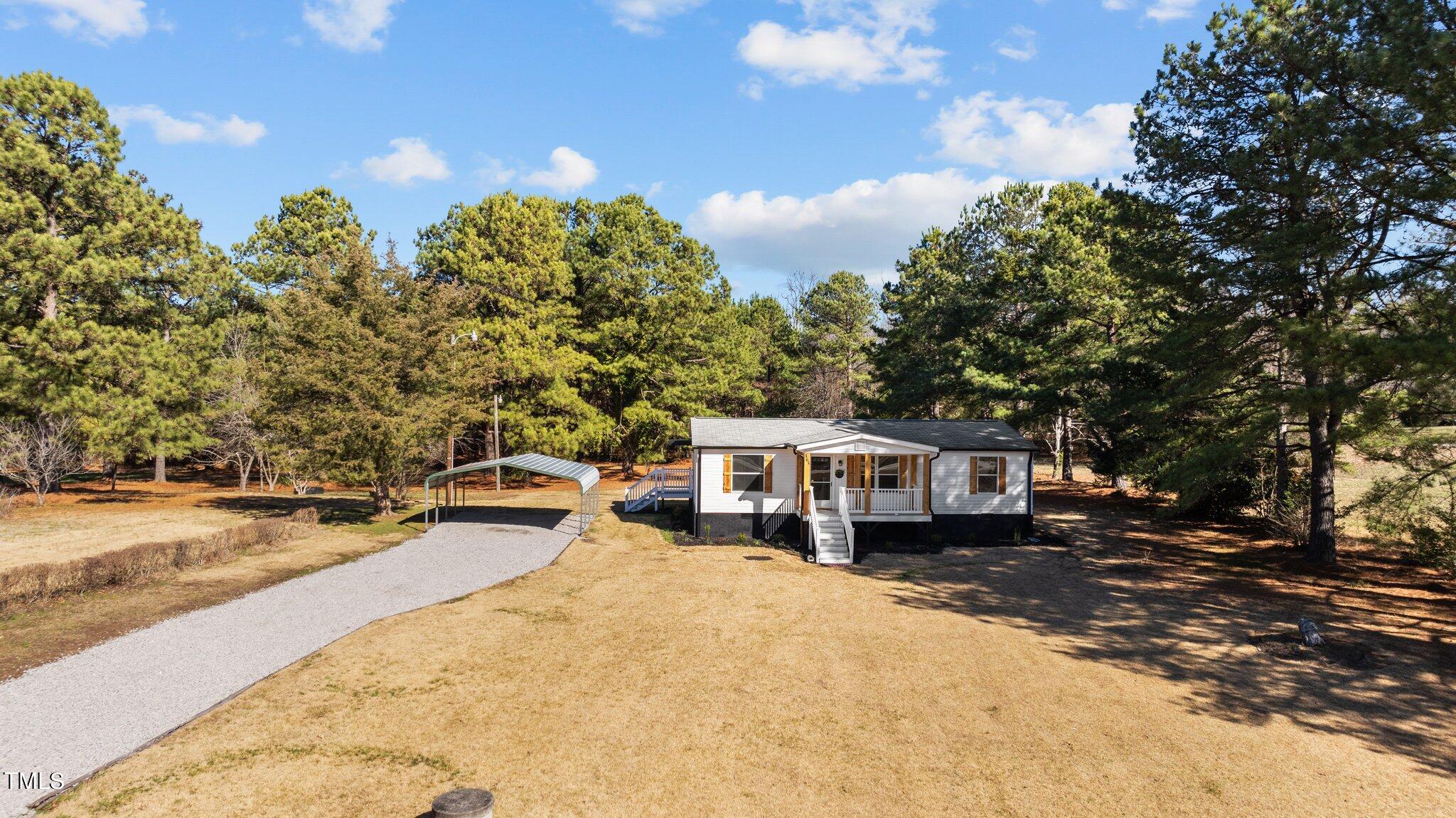 365 Rev Henderson Road Henderson, NC 27537 - Photo 38 of 48 a view of a house with a patio