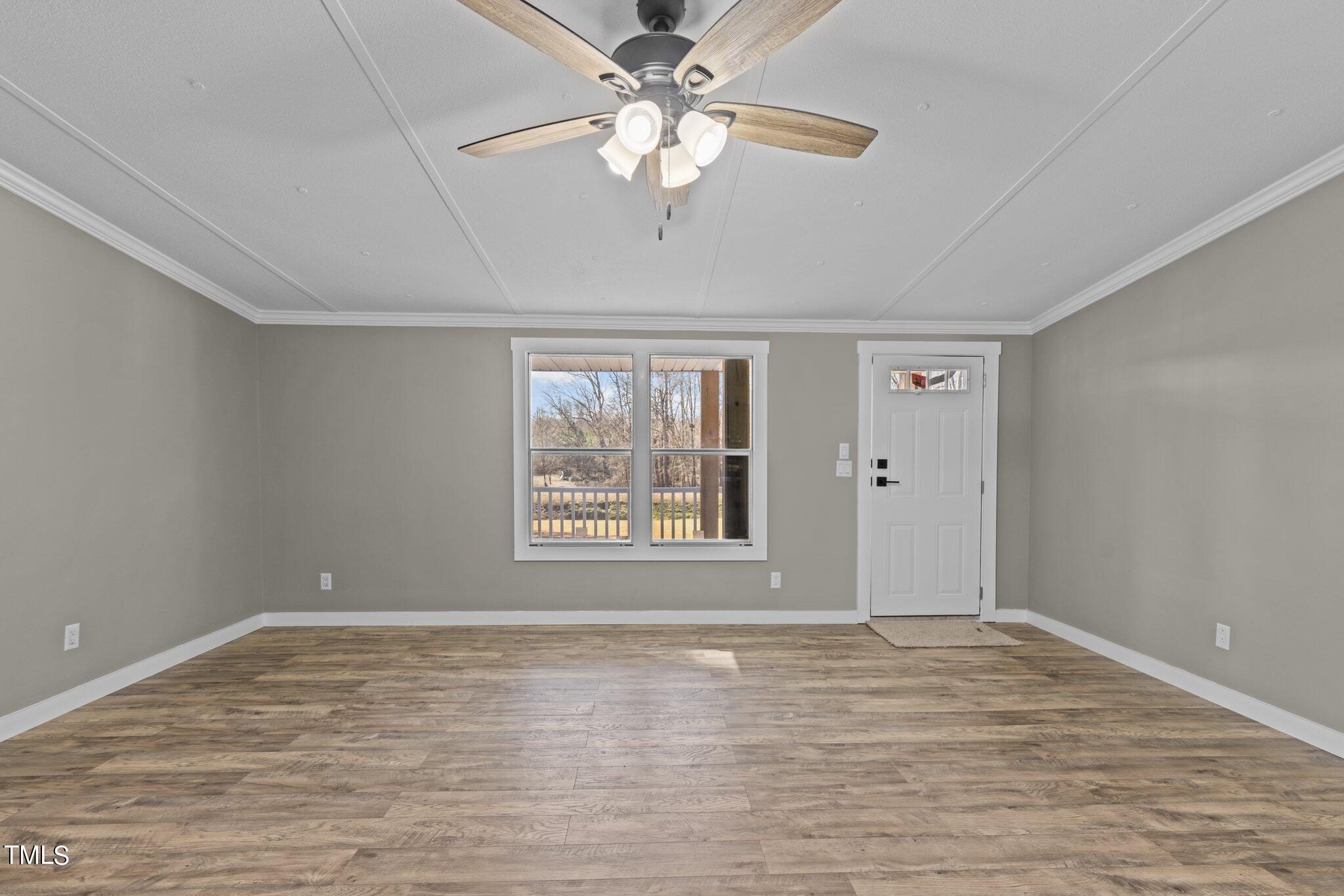 365 Rev Henderson Road Henderson, NC 27537 - Photo 6 of 48 a view of an empty room with a window