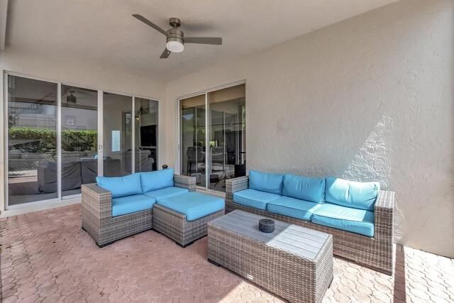 a living room with furniture and a window