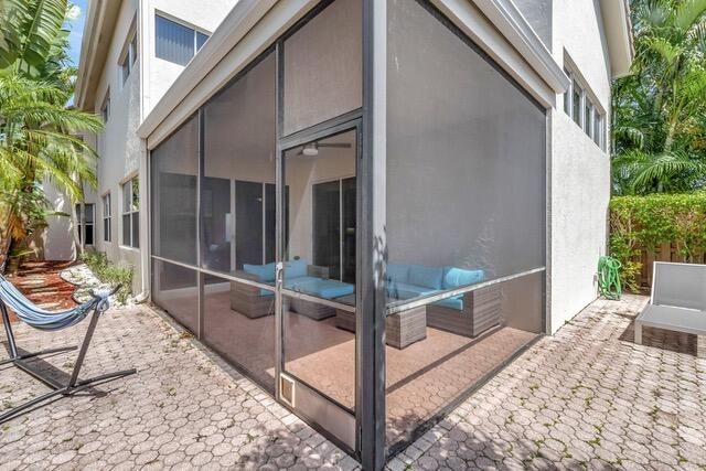 a view of roof deck with patio