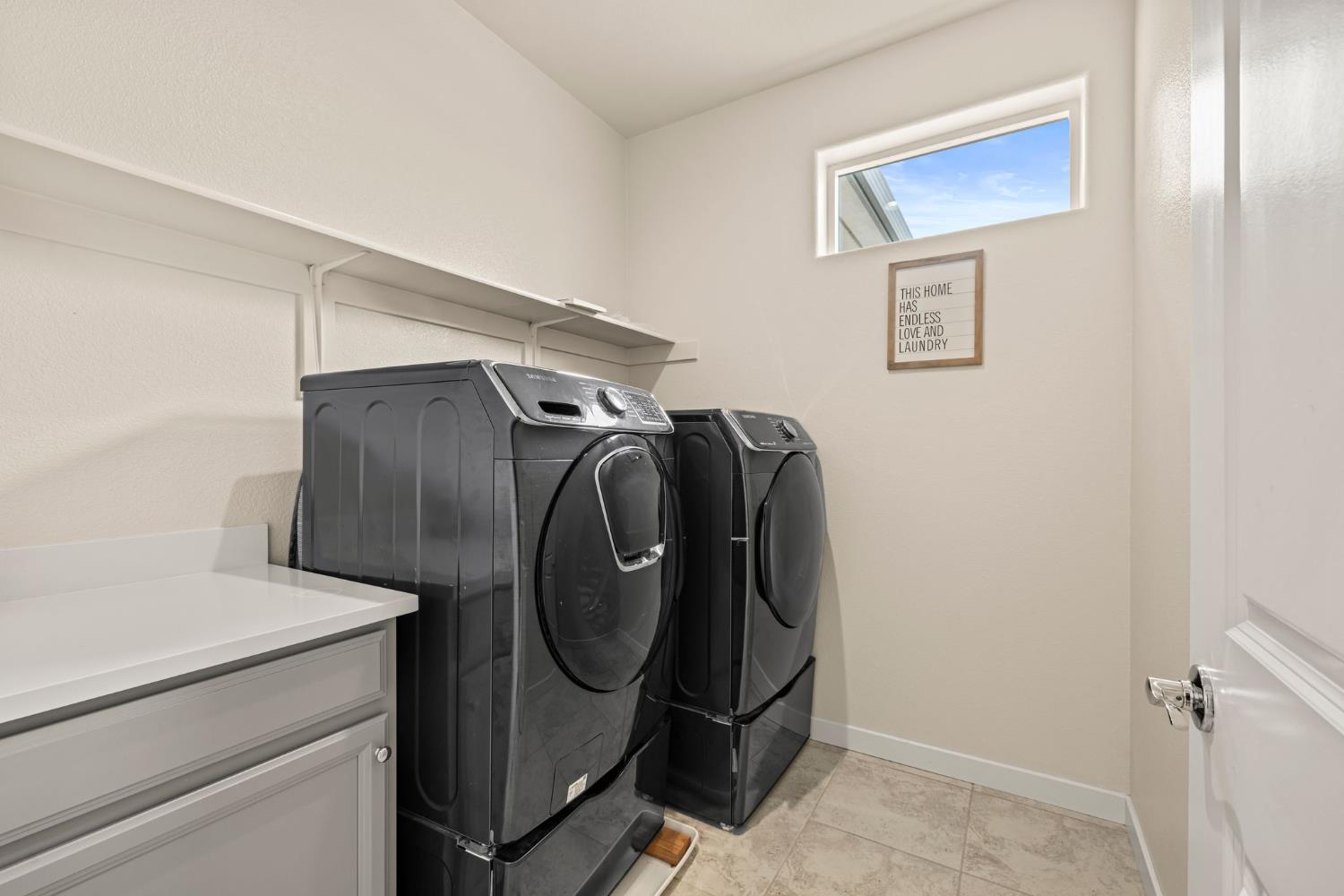 4040 Aura Way Rancho Cordova, CA 95742 - Photo 32 of 49 a utility room with dryer and washer