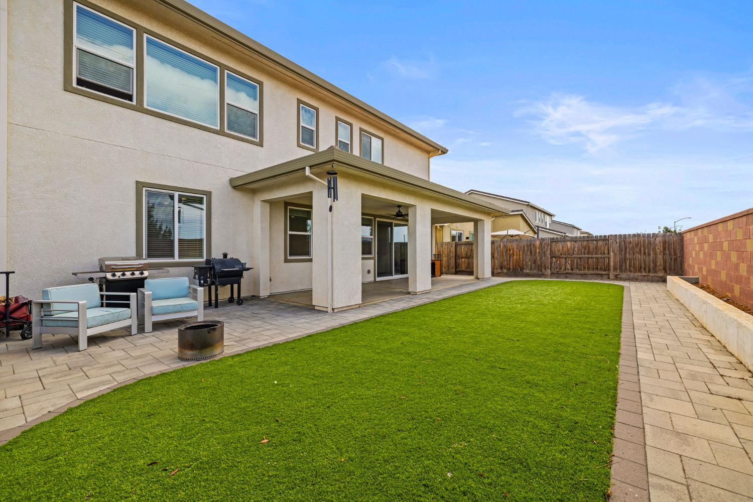 4040 Aura Way Rancho Cordova, CA 95742 - Photo 4 of 49 a view of a house with a backyard