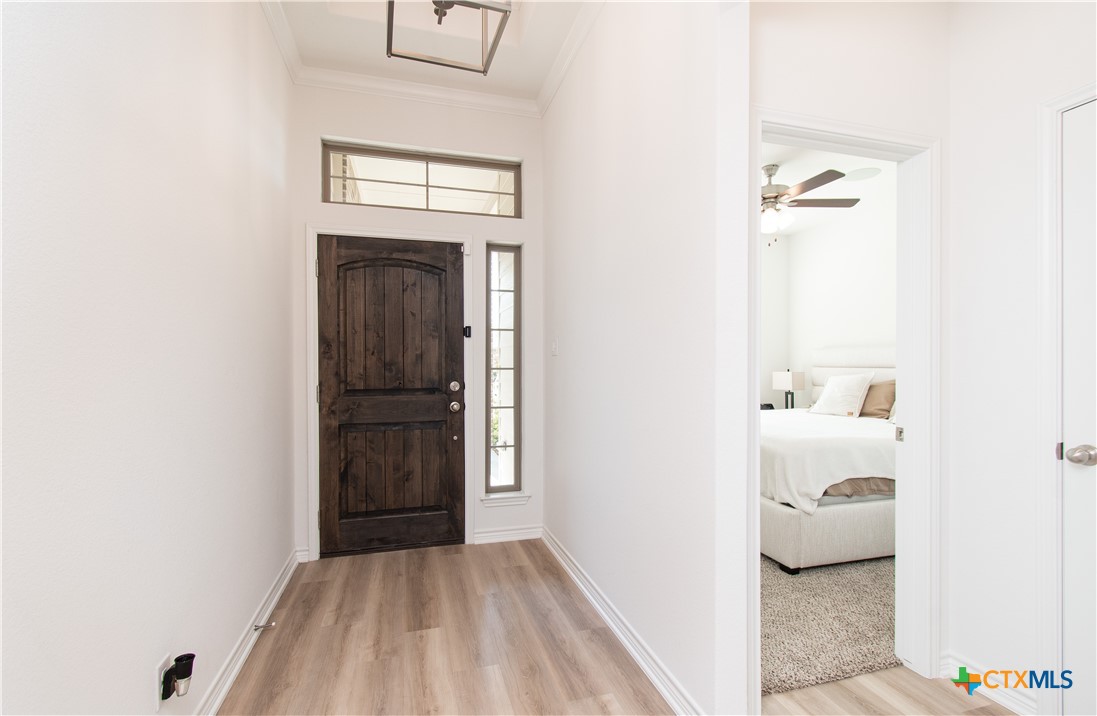 1224 Bending Branch Way Temple, TX 76502 - Photo 2 of 25 a view of hallway with wooden floor