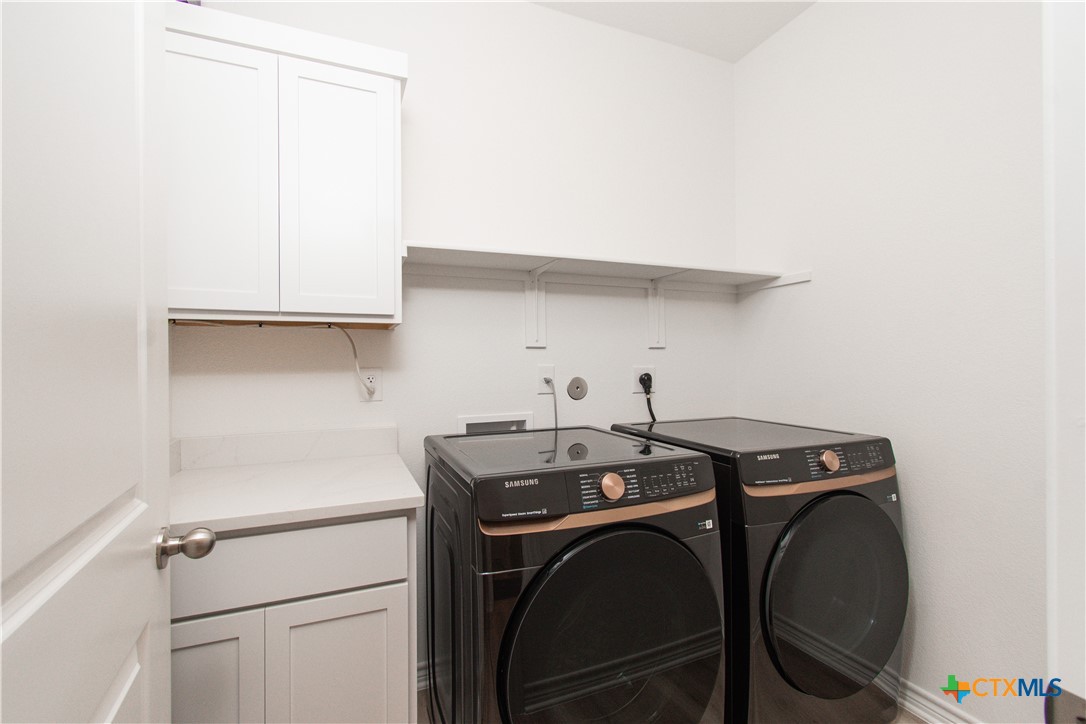 1224 Bending Branch Way Temple, TX 76502 - Photo 24 of 25 a utility room with dryer and washer