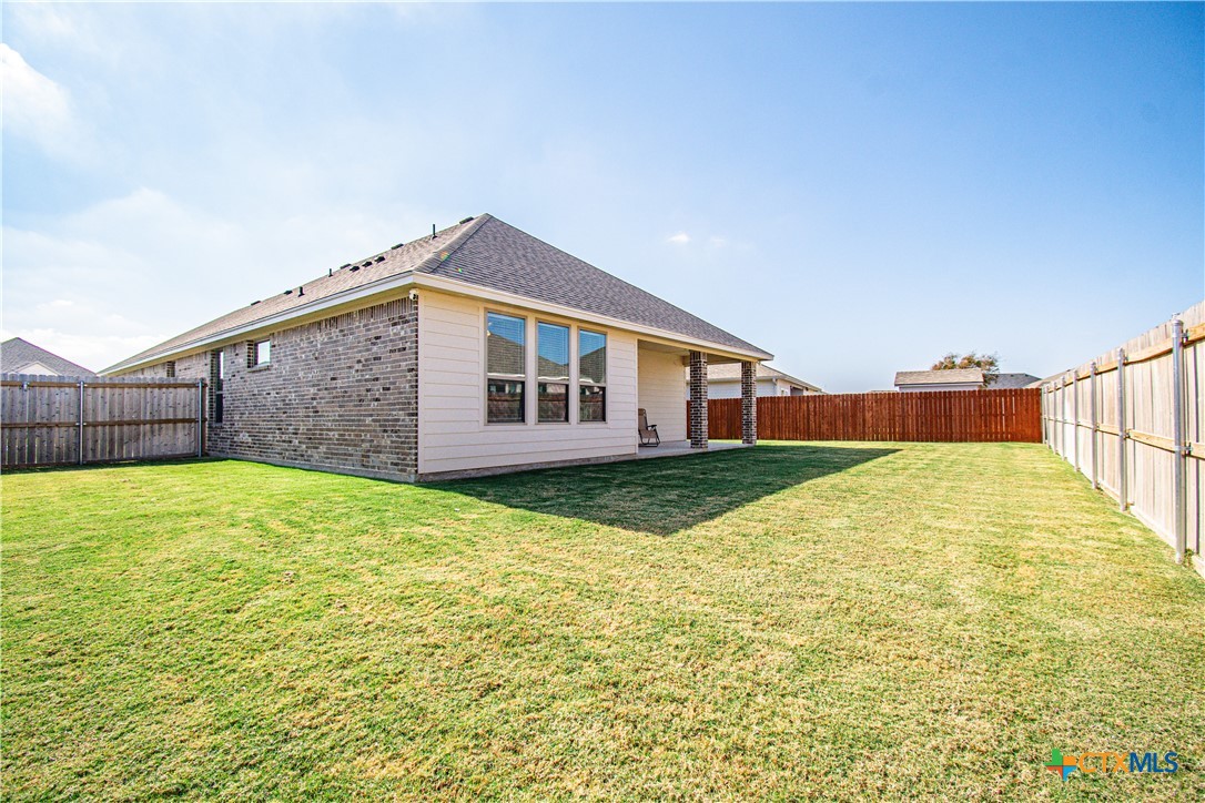 1224 Bending Branch Way Temple, TX 76502 - Photo 25 of 25 a backyard of a house with wooden fence