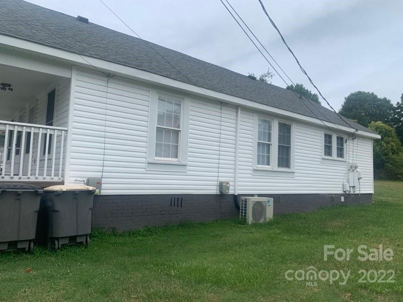 907 Indiana Street Kannapolis, NC 28083 - Photo 6 of 10 a view of a house with a backyard