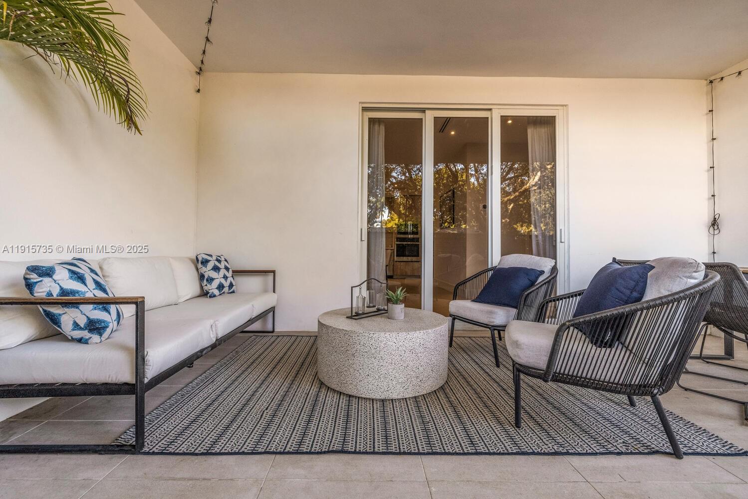 2851 Southwest 33rd Court, Unit 2851 Miami, FL 33133 - Photo 36 of 45 a living room with furniture and a window