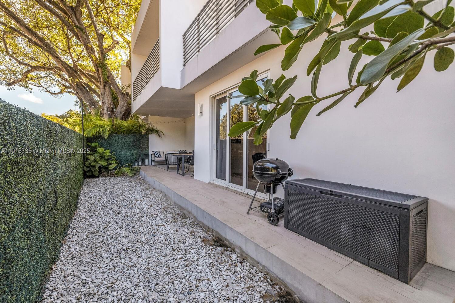 2851 Southwest 33rd Court, Unit 2851 Miami, FL 33133 - Photo 39 of 45 a view of a house with a yard