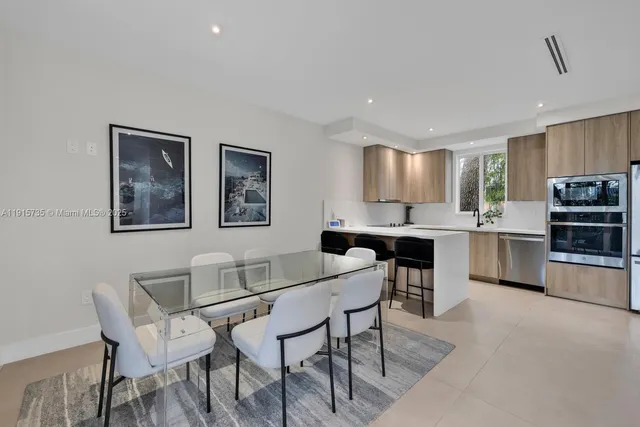 a view of kitchen with breakfast area