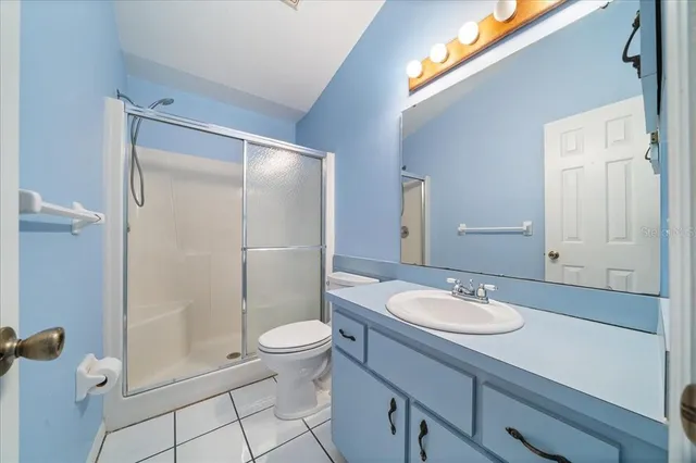 a view of entryway and hall with a chair