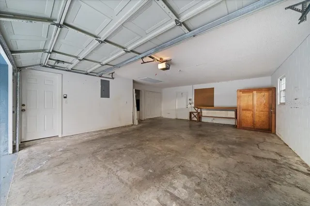 a view of swimming pool with a yard