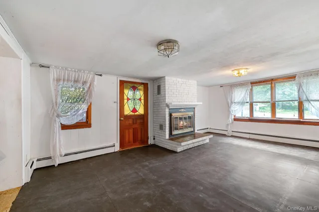 an empty room with windows