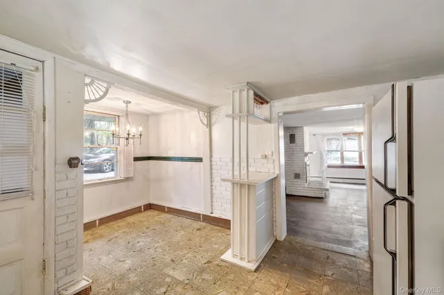 a view of a walk in closet and bedroom