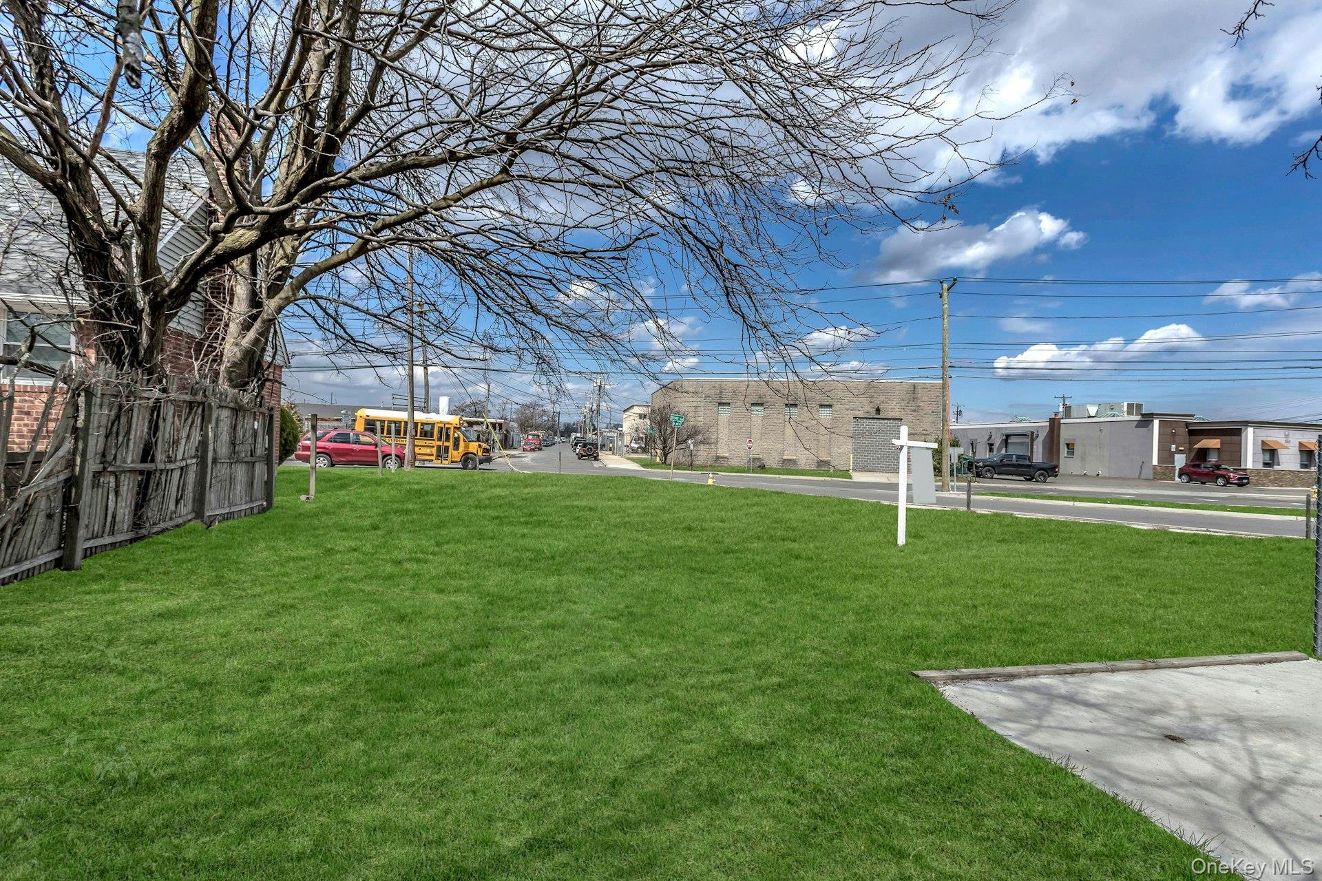 View of yard featuring fence