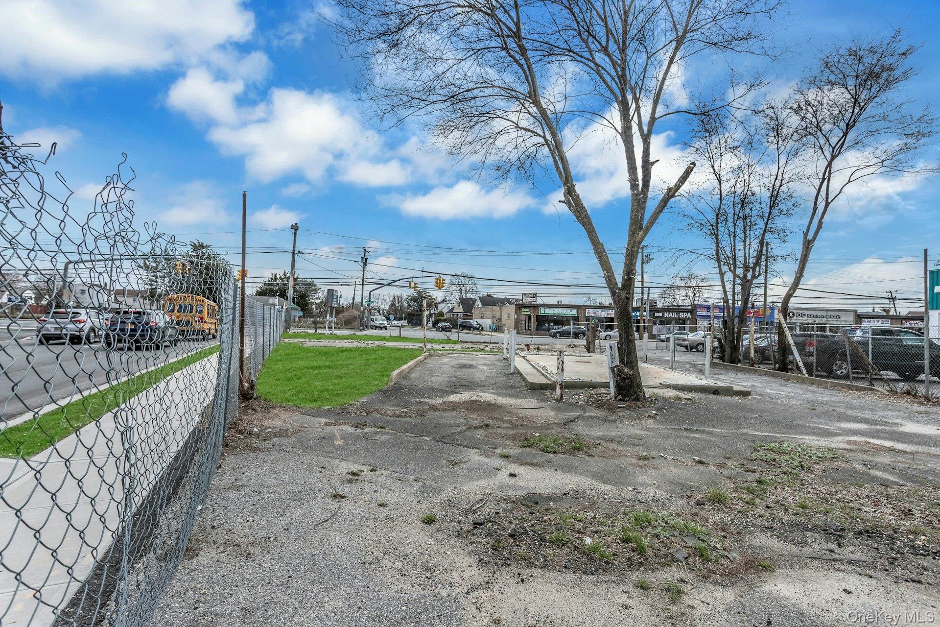 899 Old Country Road Westbury, NY 11590 - Photo 14 of 19 View of street with traffic lights