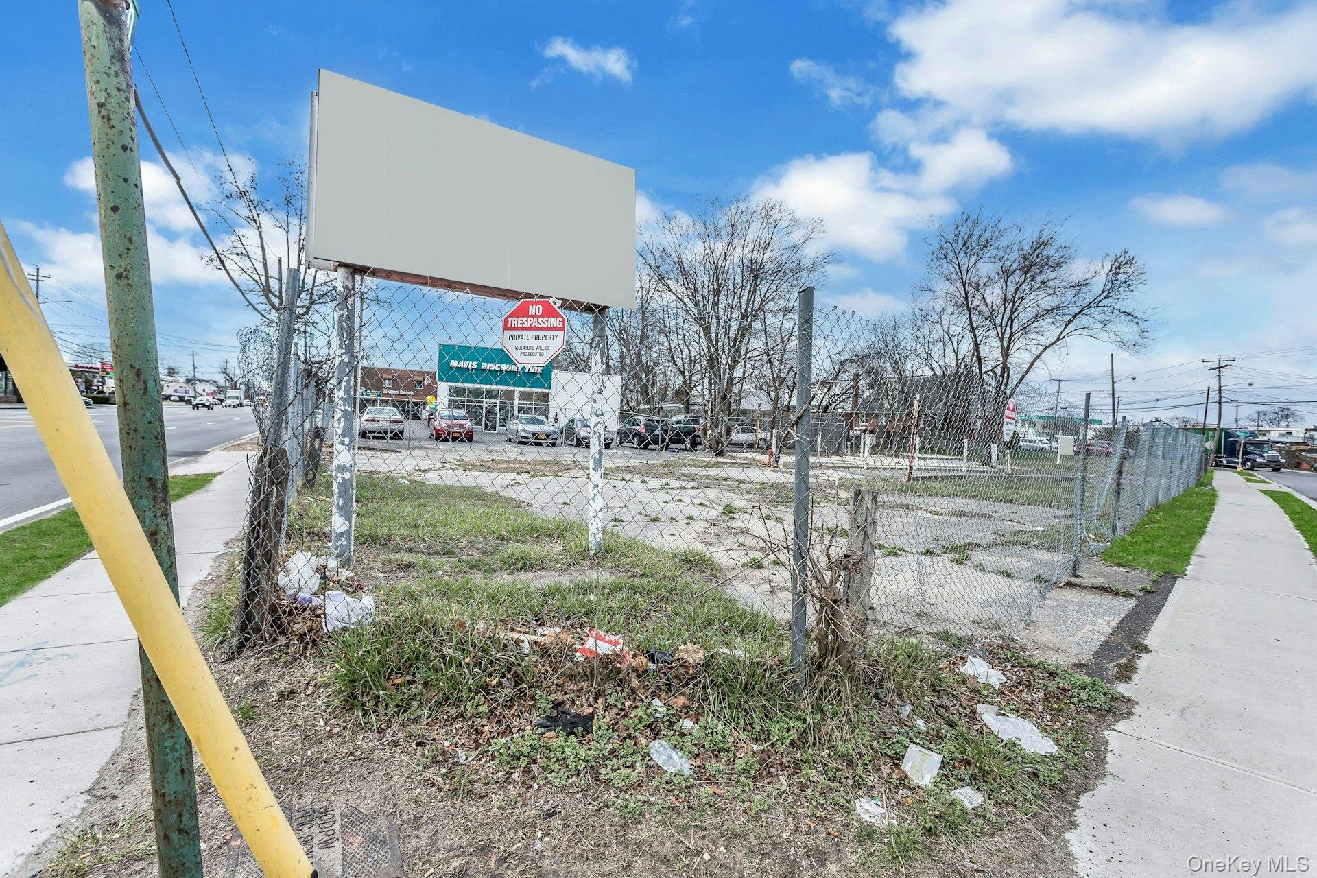 899 Old Country Road Westbury, NY 11590 - Photo 19 of 19 View of community featuring fence