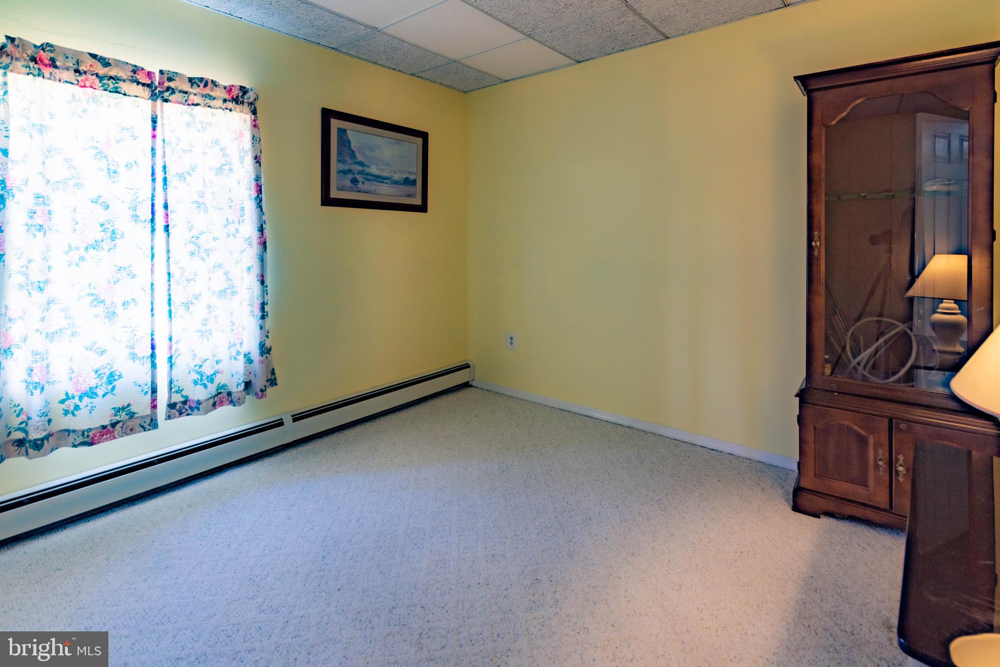 9619 Boyds Turn Road Owings, MD 20736 - Photo 33 of 69 a view of a room with rack on the wall